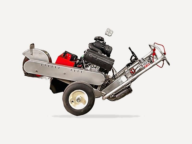 Dosko 620-20HE 20 HP stump grinder in side view with the handlebar folded back
