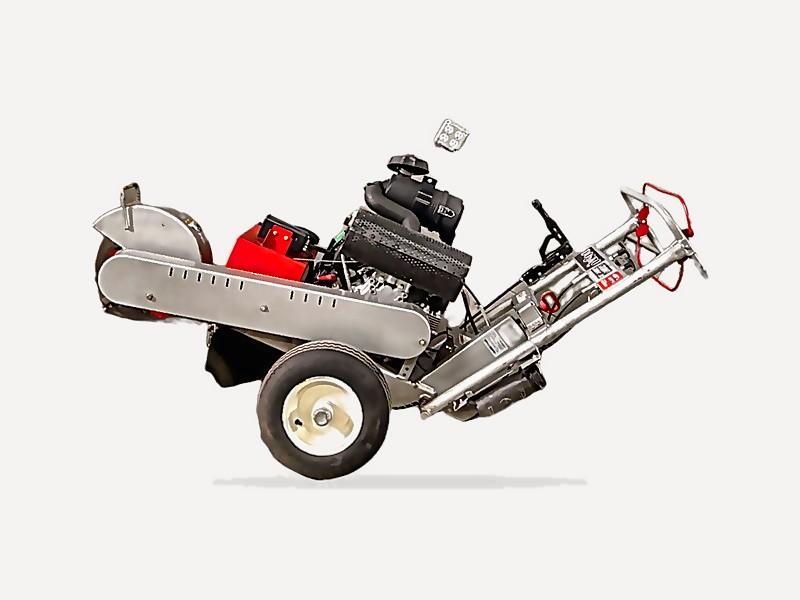 Dosko 620-20HE stump grinder showing the Honda V twin engine and cutter wheel guard