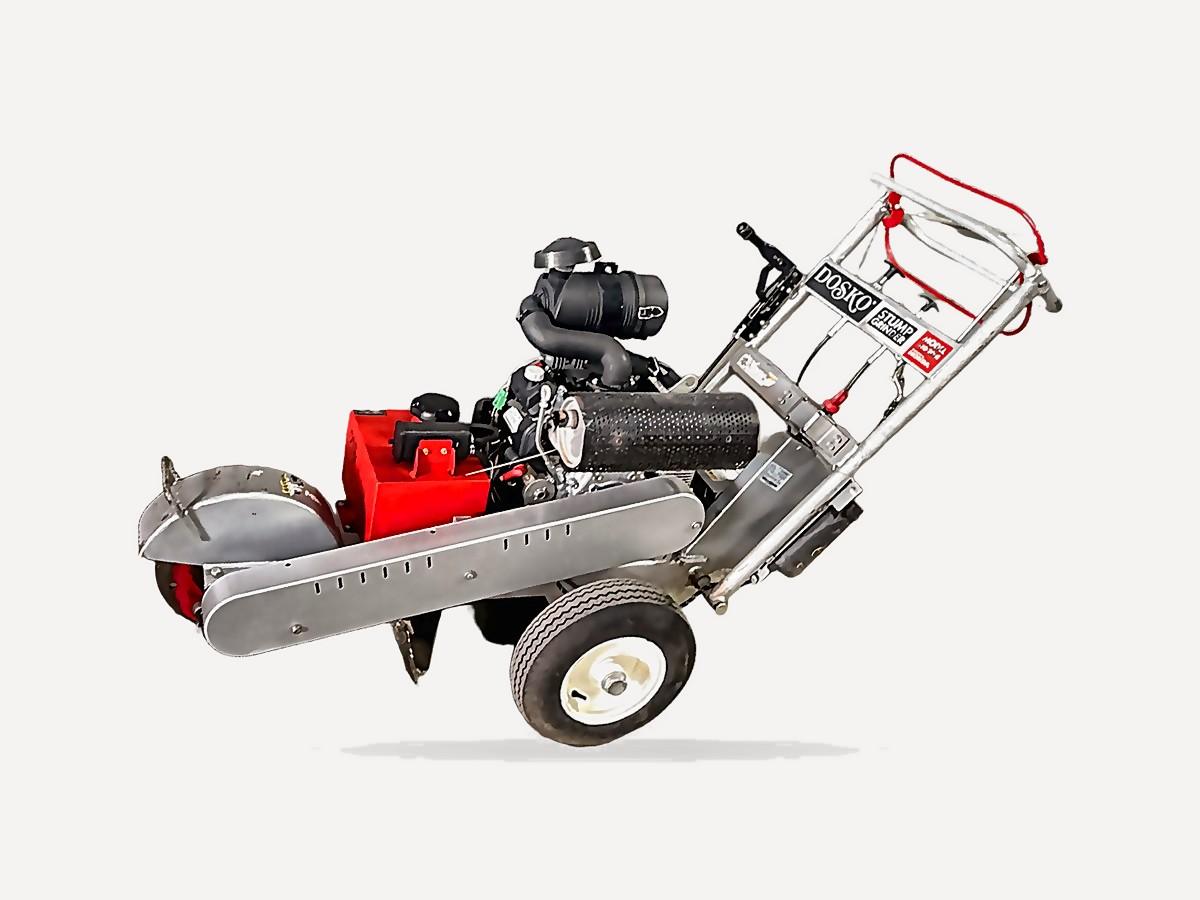 Dosko 620-20HE stump grinder from the front, showing the 14 in cutter wheel guard