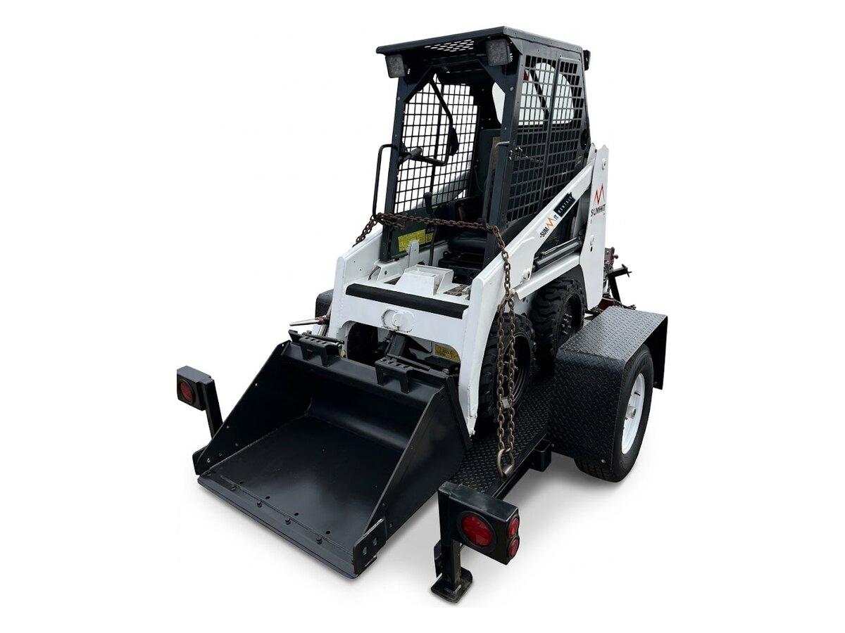 10 ft tilt deck trailer with a Summit Rentals skid steer loaded, the deck tilts so equipment drives on without ramps