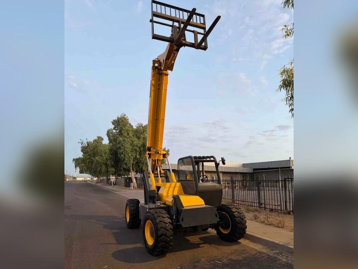 Gehl rough terrain telehandler rental delivered by Summit Rentals to an industrial street in Glendale, AZ