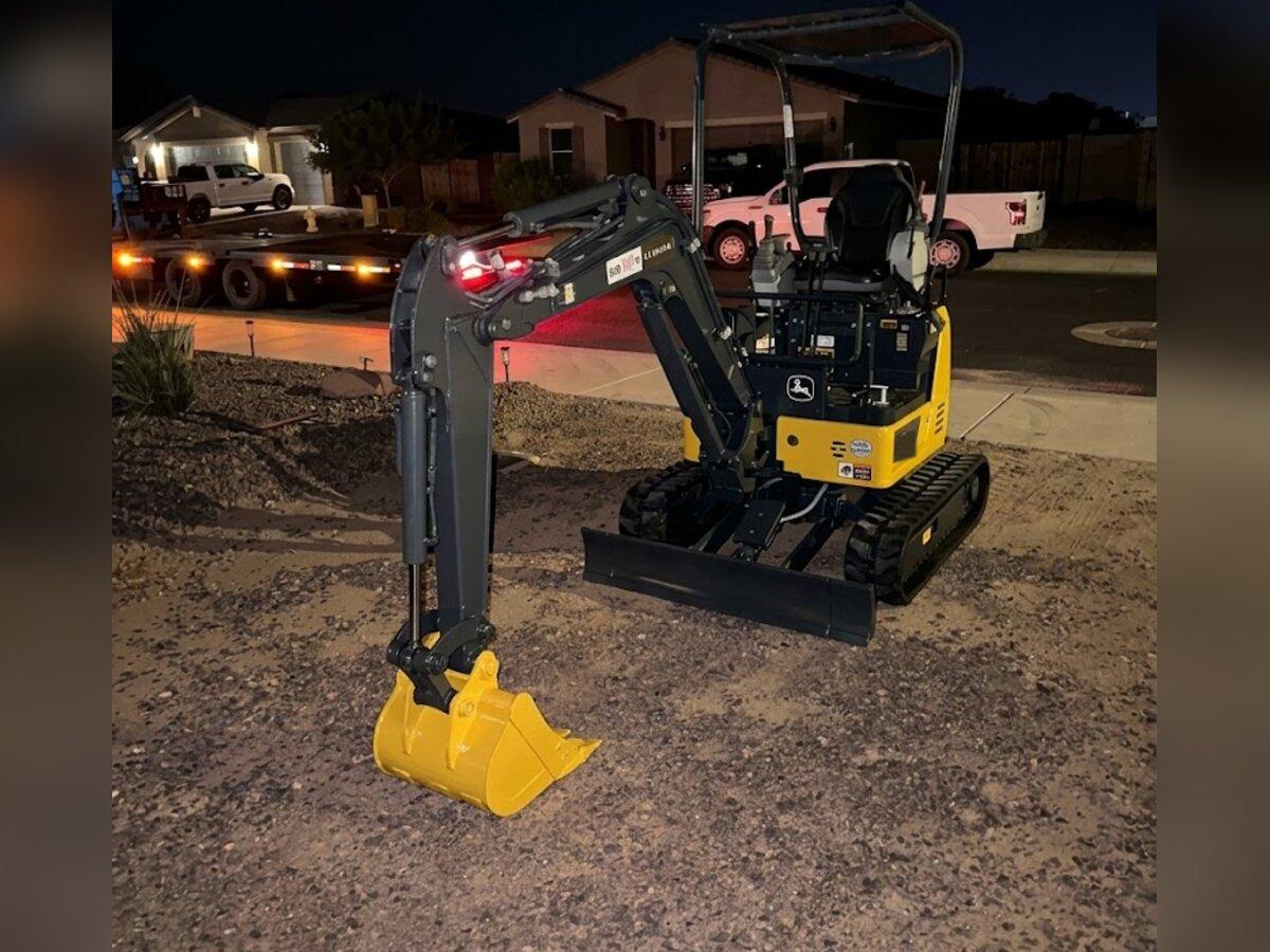 John Deere 17G mini excavator rental delivered early in the morning by Summit Rentals to a new home lot in Goodyear, AZ