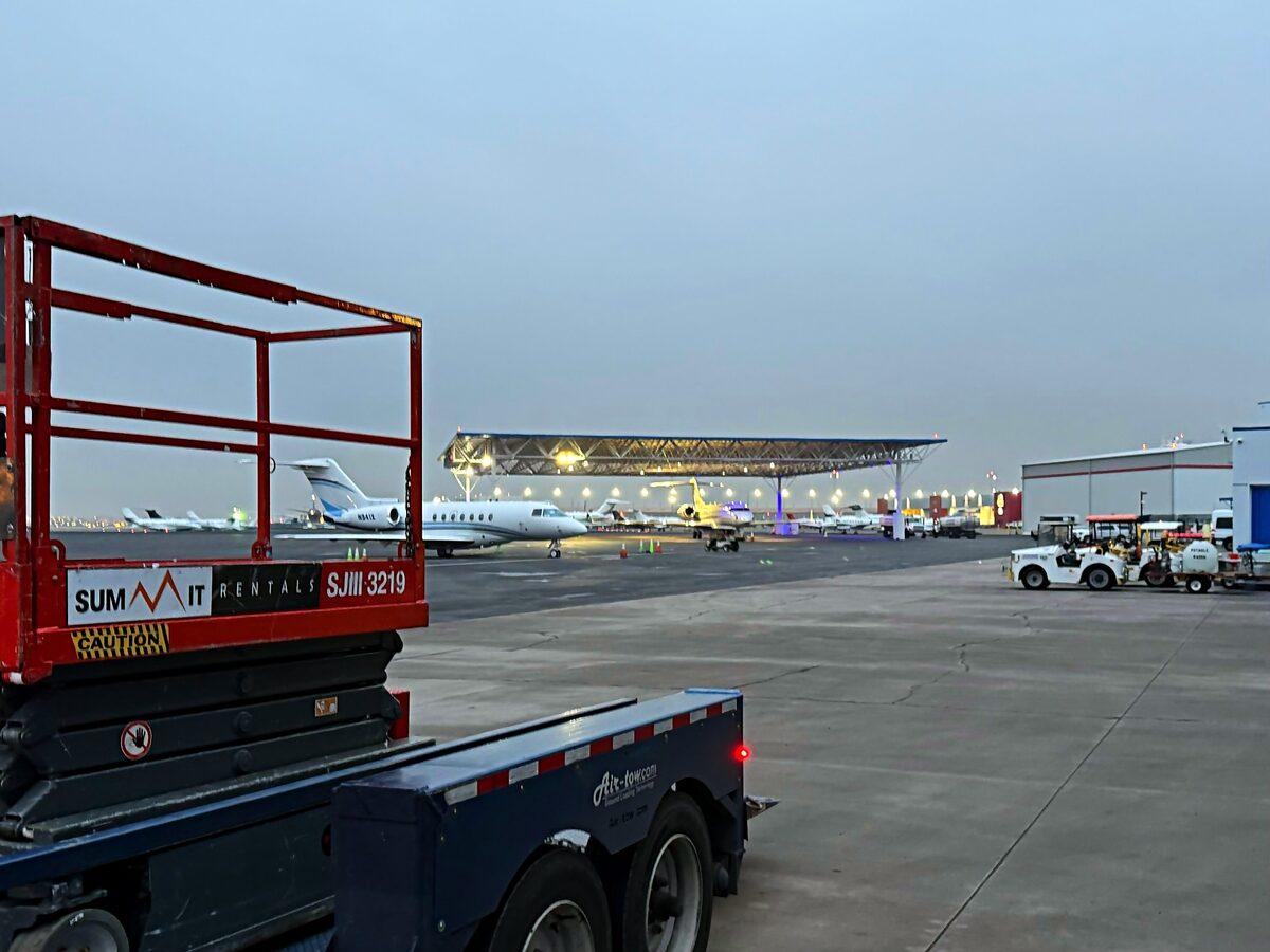 Summit Rentals Skyjack scissor lift delivered to an aircraft hangar at a Phoenix-area airport
